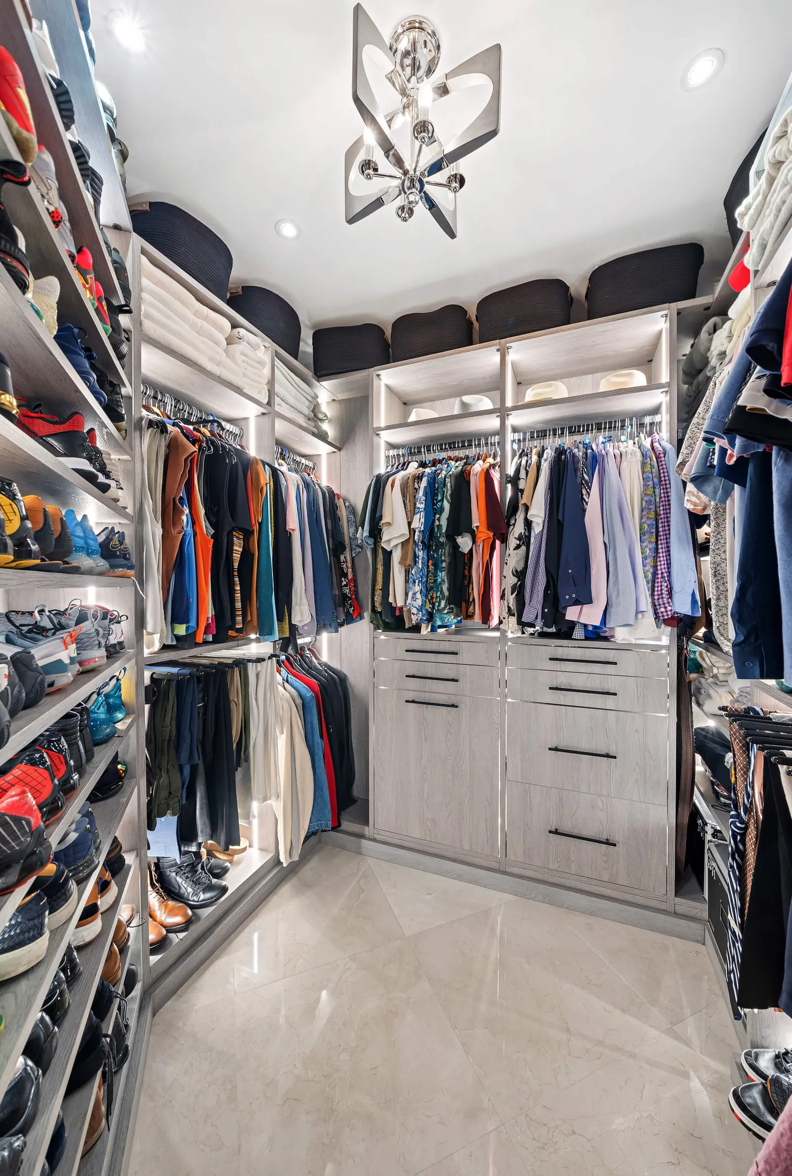 Sky-High Brickell Condo, Primary closet by Kathryn Interiors