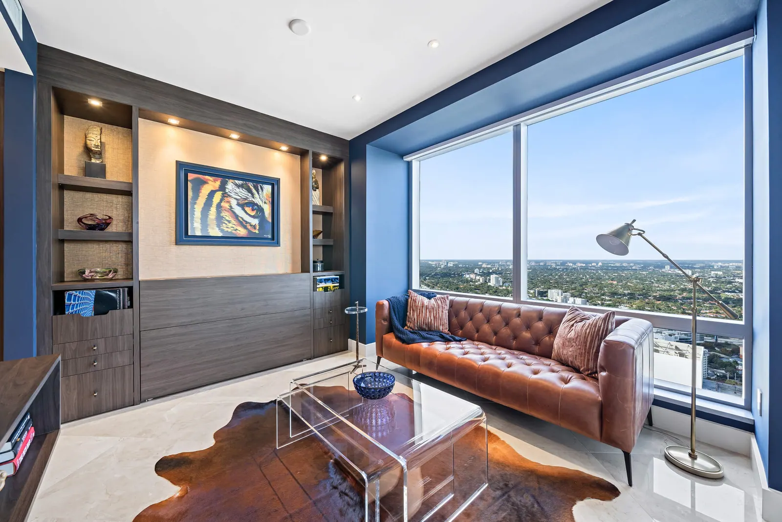 Sky-High Brickell Condo, Den by Kathryn Interiors