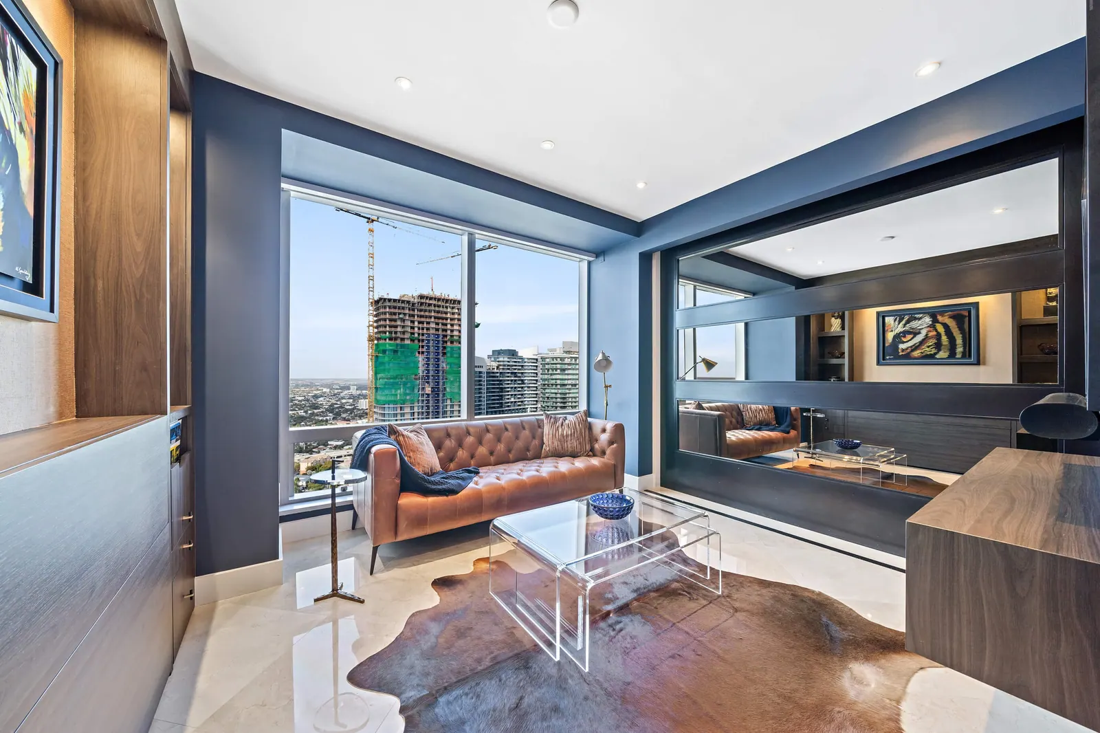 Sky-High Brickell Condo, Den by Kathryn Interiors