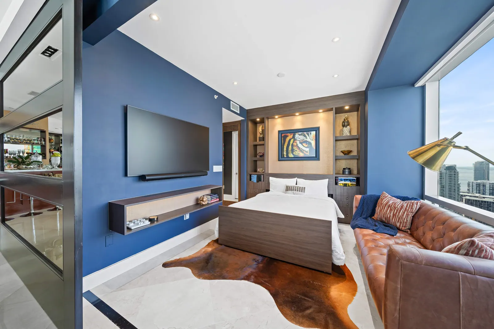 Sky-High Brickell Condo, Den by Kathryn Interiors