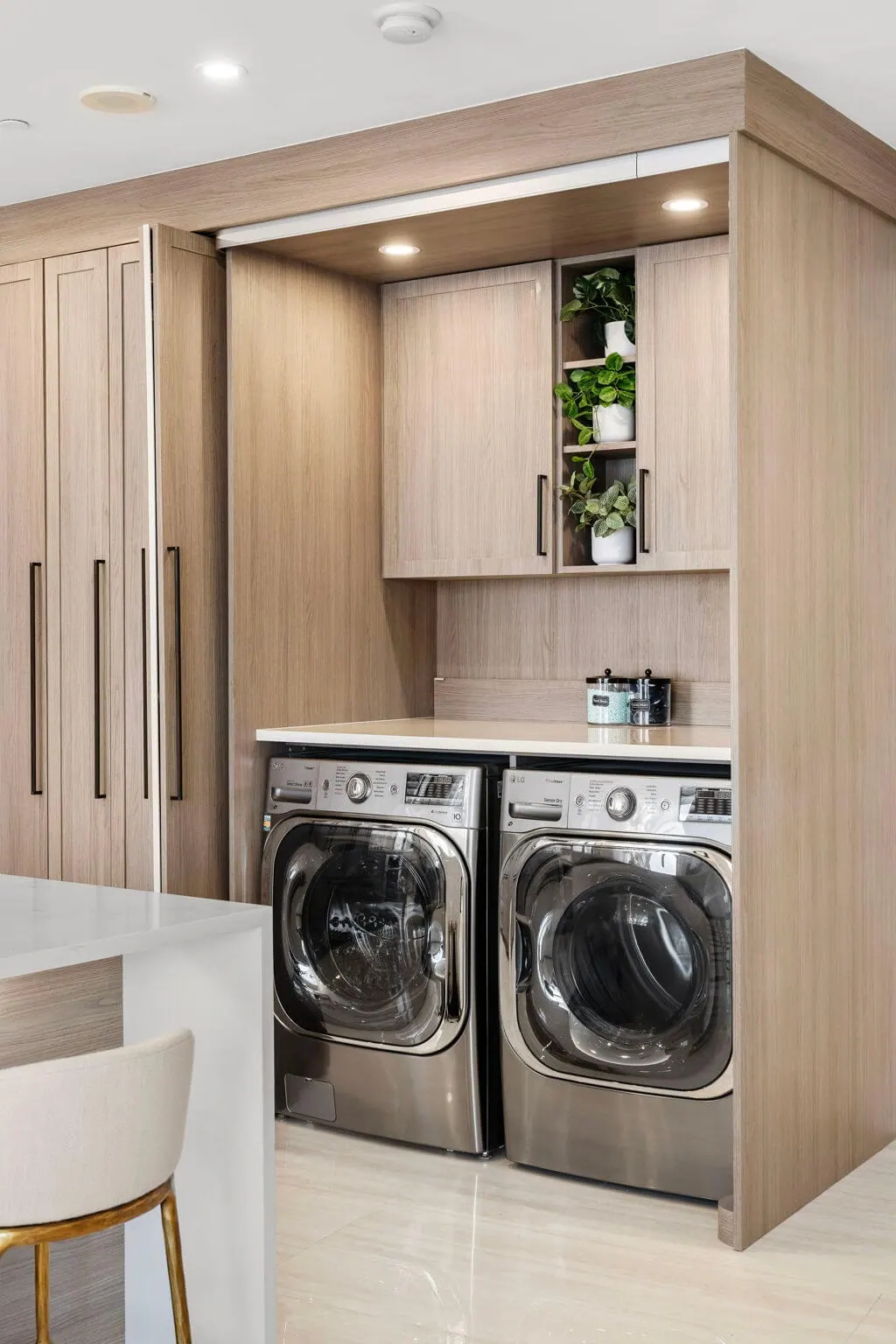 Luxury Waterfront Condo, Kitchen and laundry by Kathryn Interiors