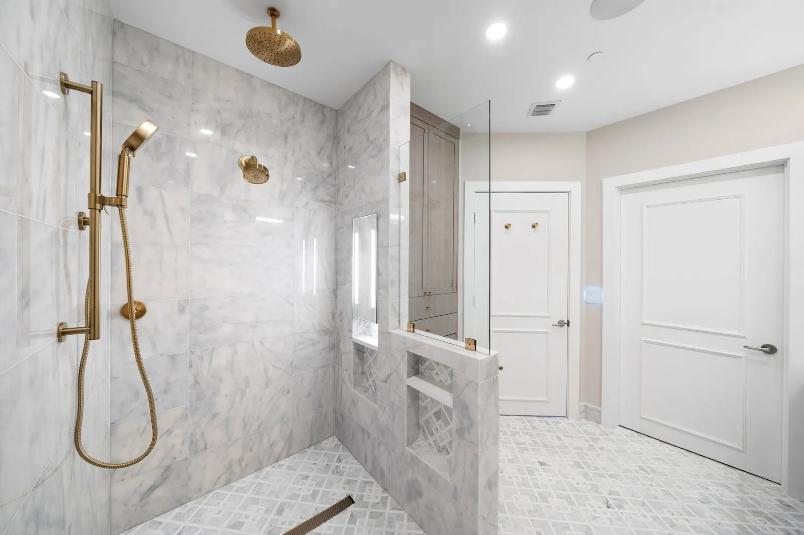 Luxury Waterfront Condo, Primary bath, shower by Kathryn Interiors