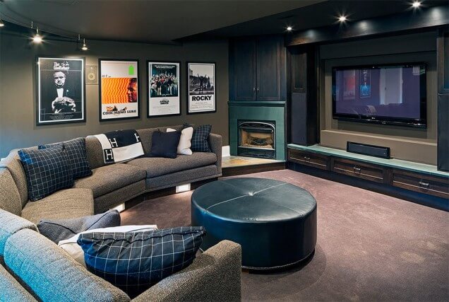 Rounded table couch in home owned cinema.